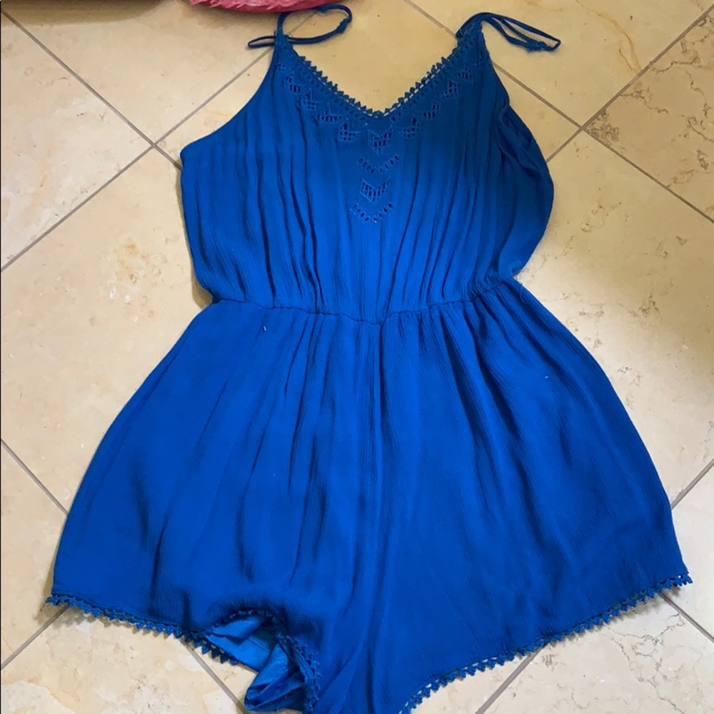 lush blue romper with detailing
